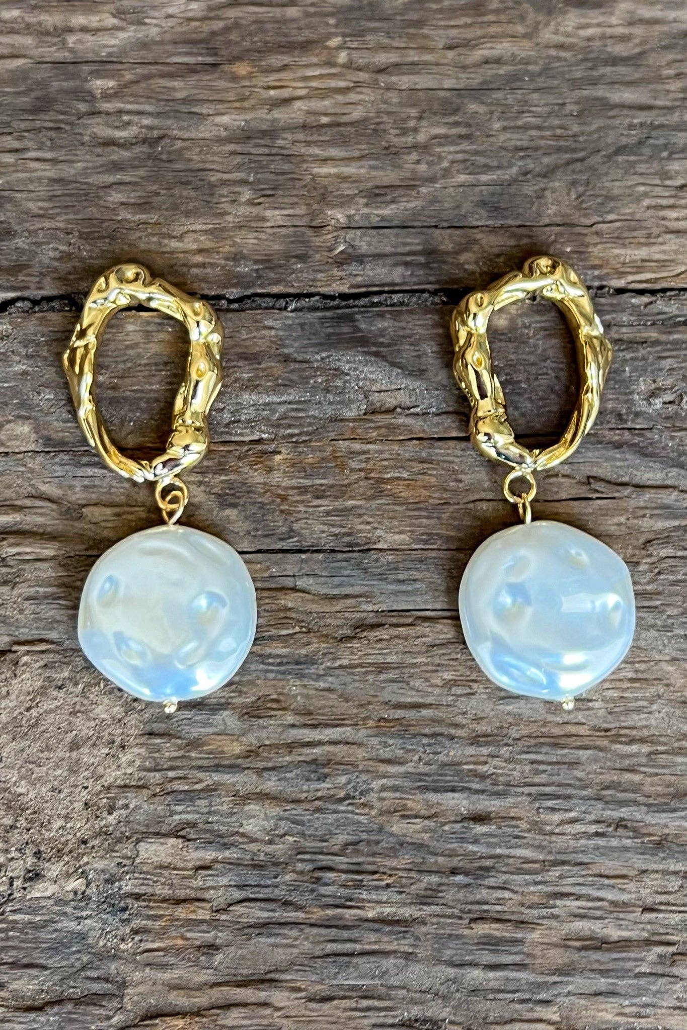 Golden pearl earrings