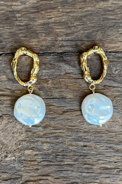 Golden pearl earrings