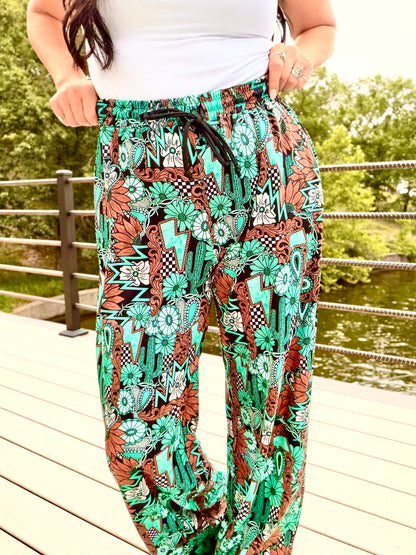 Tattoos in Turquoise Pants