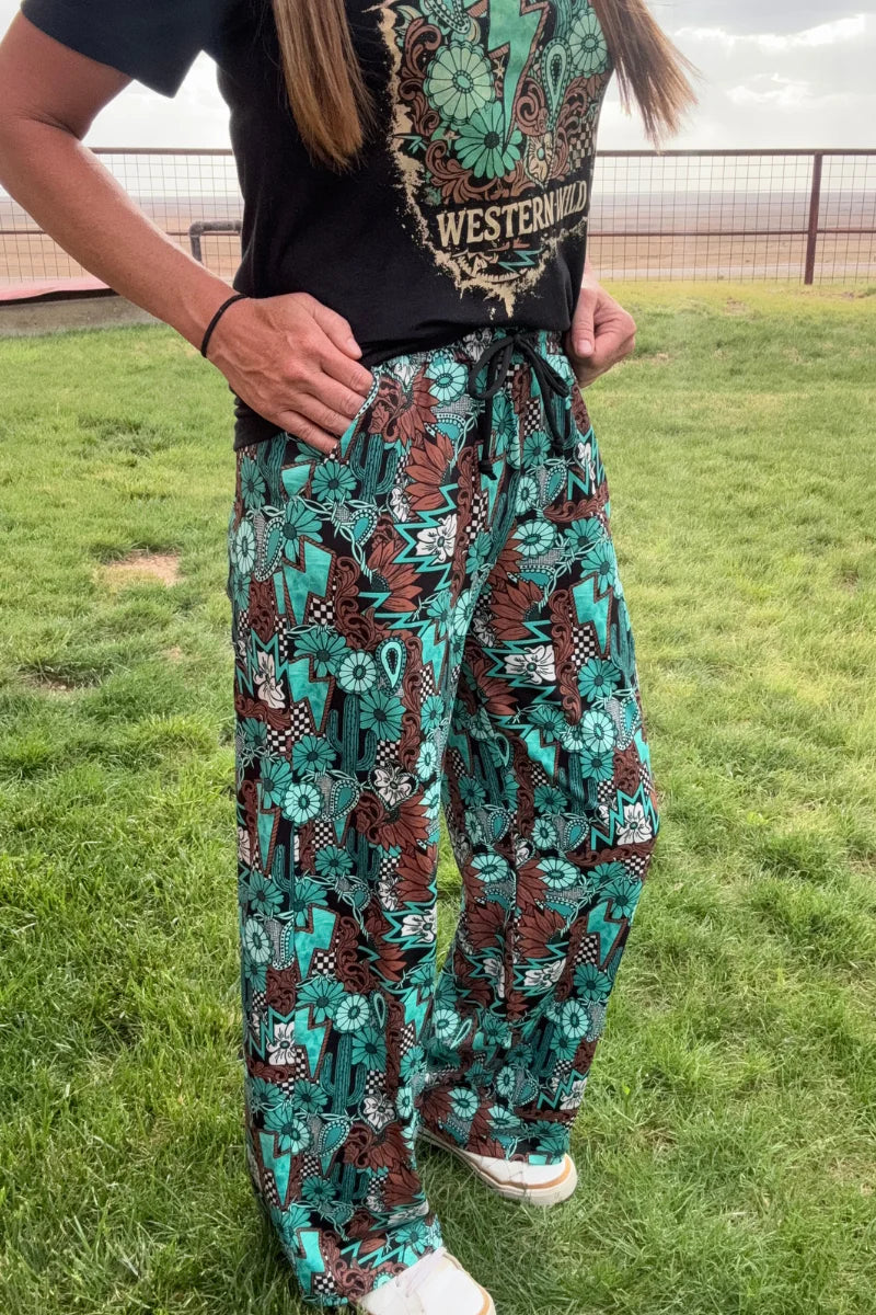 Tattoos in Turquoise Pants